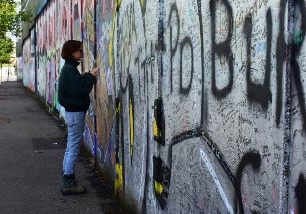 A vibrant street graffiti mural showcasing urban artistic expression.